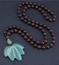 Load image into Gallery viewer, Carved Stone and Wooden Bead Long Necklace
